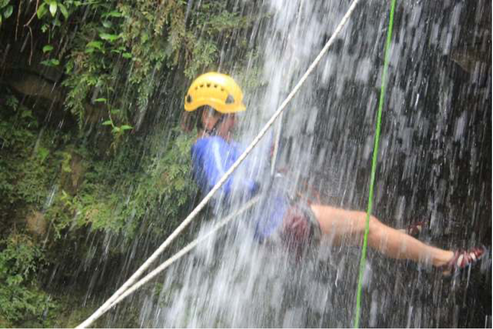 Rappelling down a waterfall was a new travel adventure for me.