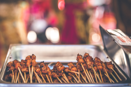 Street markets and street food can be perfect for trying local delicacies.